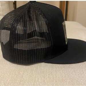 Yupoong The Classic Black Trucker Hat with Mexican metal plate